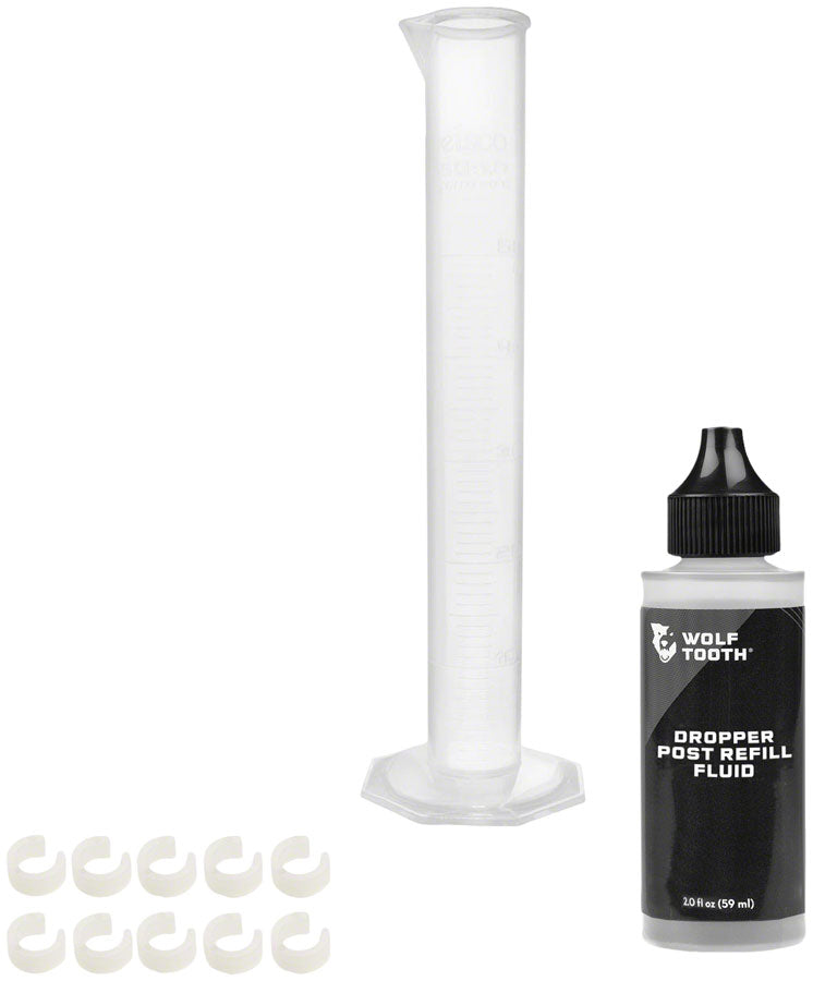 Wolf Tooth Resolve Dropper Post Service Kit - Refill Fluid 2oz, Graduated Cylinder, 10 Travel Adjustment Spacers